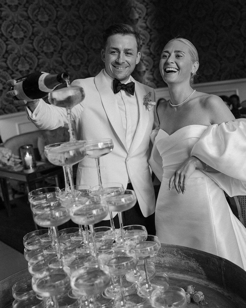 The champagne tower moment — pure joy